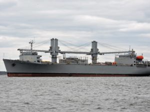 Sailing Past a Navy Freighter
