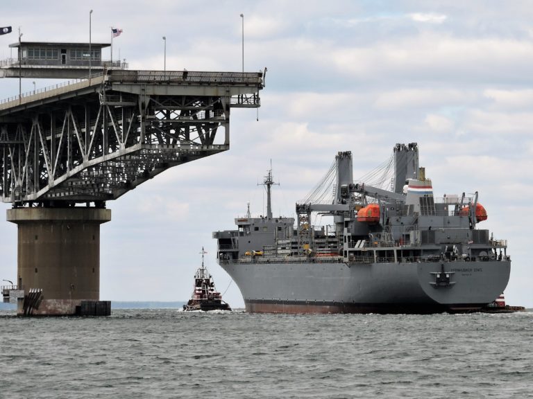 Sailing Past a Navy Freighter